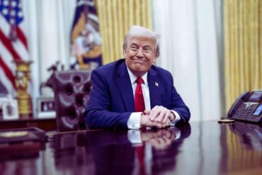 trump setting at oval office after signing tariffs executive orders